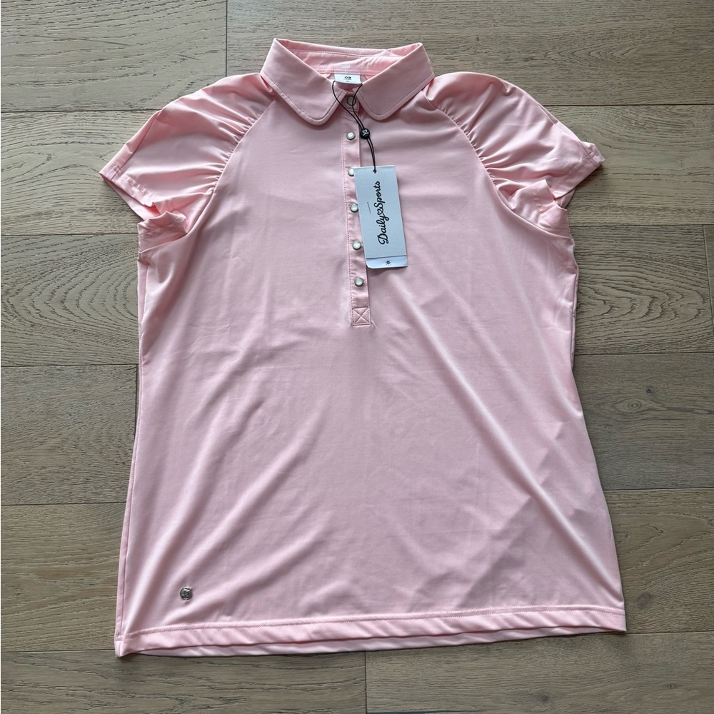 Daily Sports Ariana cap sleeve polo shirt in a light pink color Xl